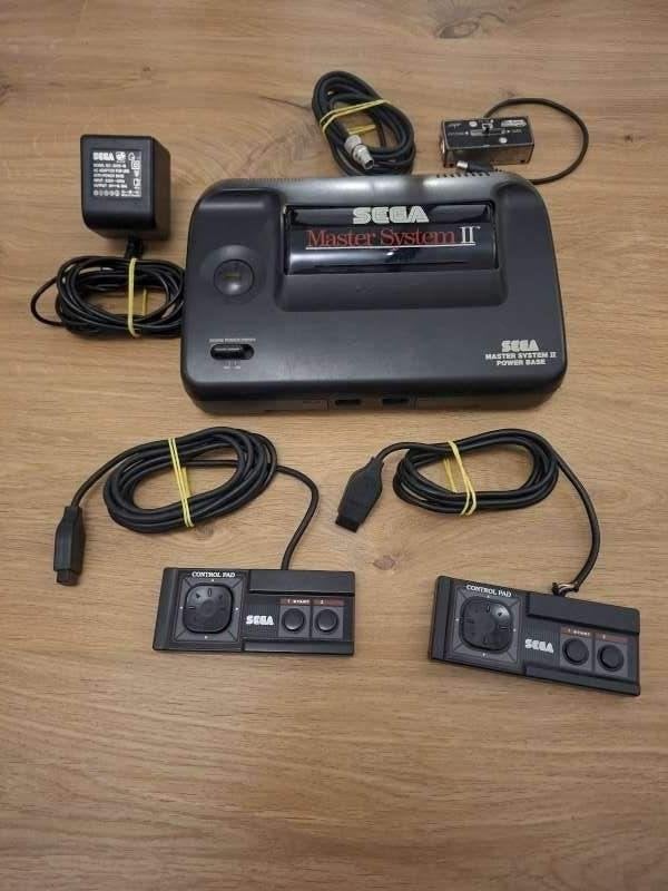 Sega Master System II set + 2 controllers + 7 games, Ophalen, Master System, Met 3 controllers of meer, Gebruikt