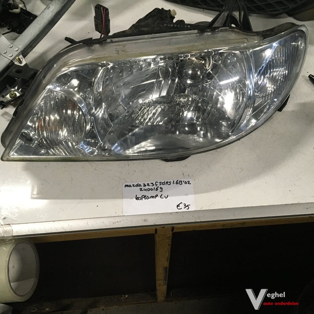 Mazda 323F 5drs 1.6 B 2002 Wagennr 2400169 Koplamp Links of, -, Utilisé, -, -