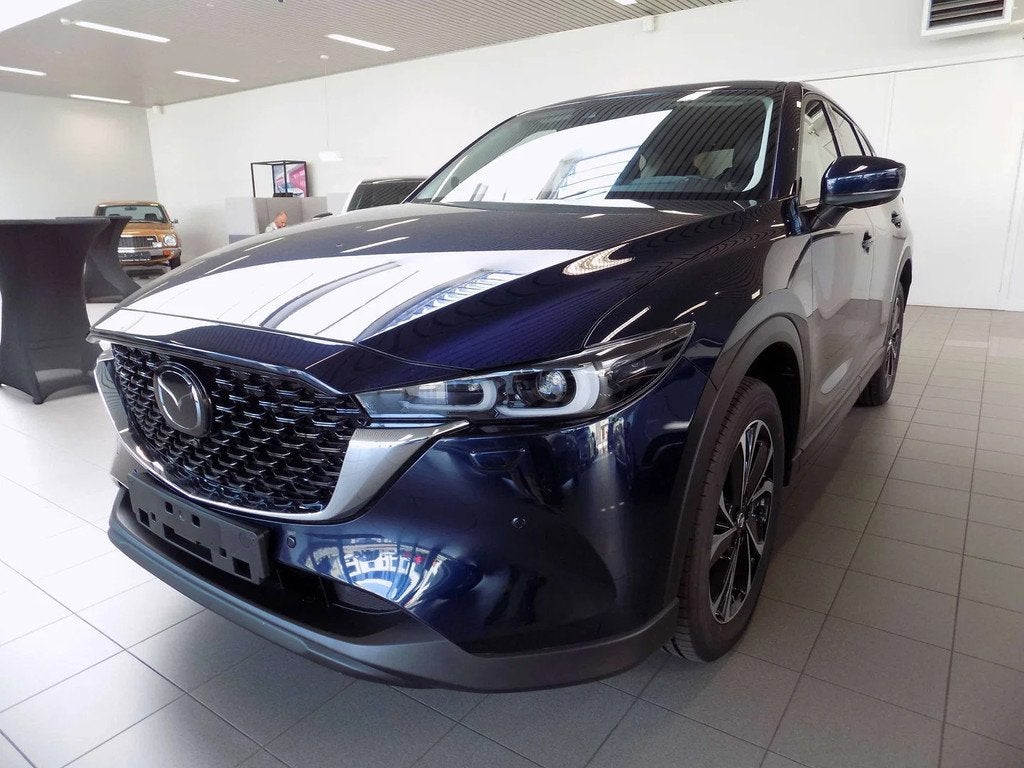 Mazda CX-5 2.0i e-SKYACTIV-G MHE 2WD Exclusive-Line, 1998 cc, Euro 6, 4 cilinders, Blauw