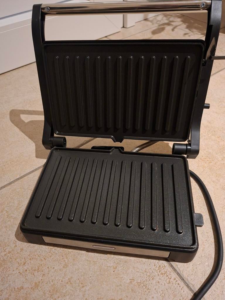 Tristar contactgrill, Ophalen