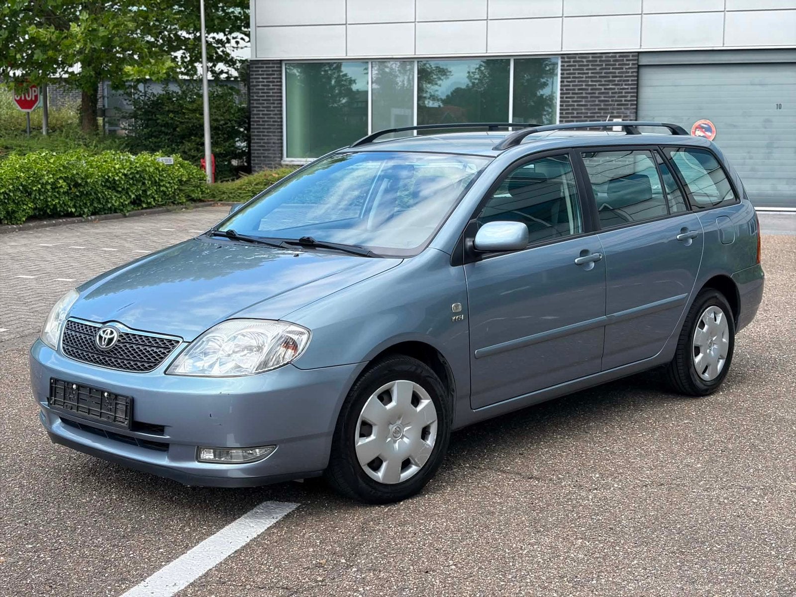 Toyota Corolla 1.6VVT-i automaat met 123.000 km gekeurd, Stof, Multifunctioneel stuurwiel, Zwart, 4 cilinders