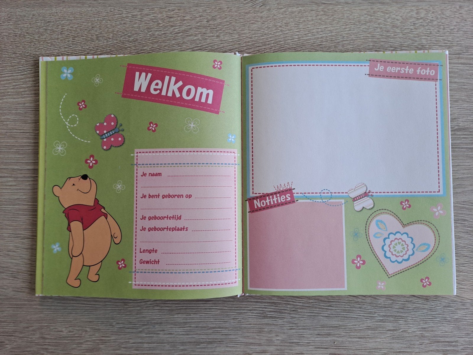 NIEUW Disney boekje: Baby's eerste jaar (gratis bij aankoop), Ophalen