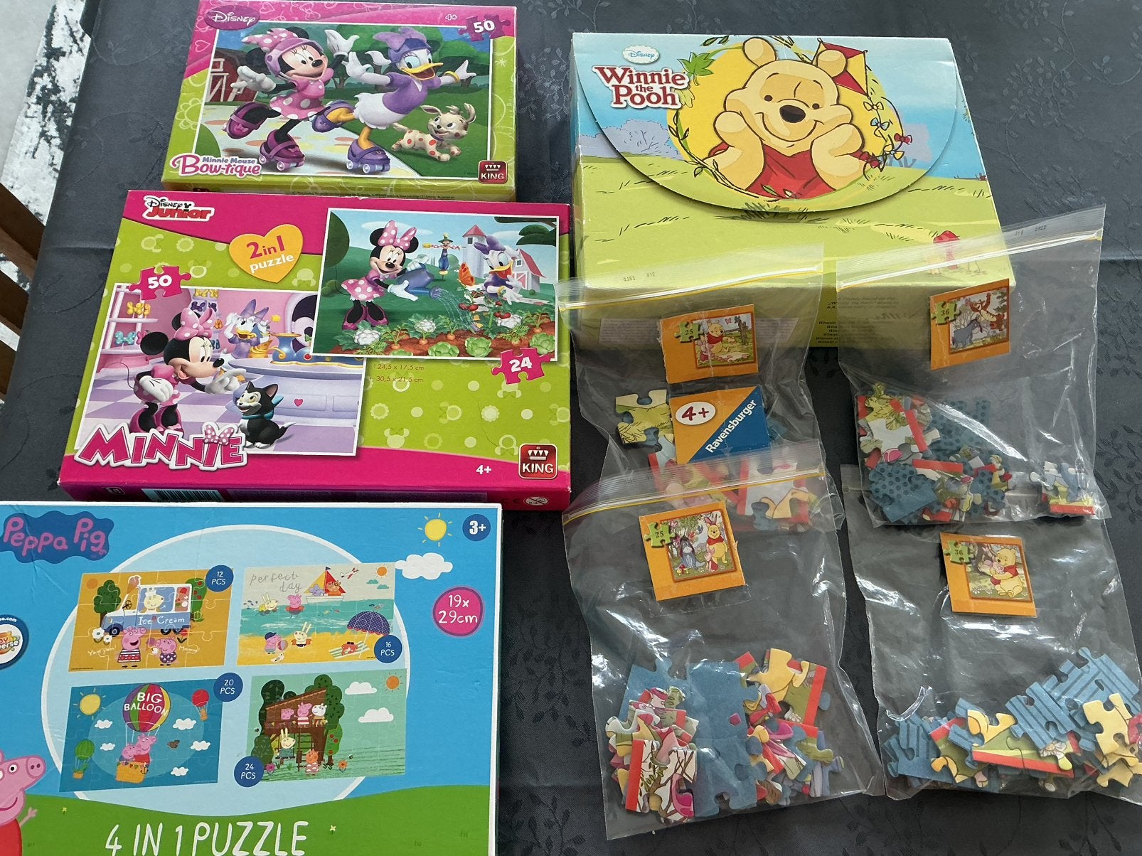Lot van 11 puzzels (winnie the pooh, Peppa Pig, Minnie ), Ophalen, Zo goed als nieuw