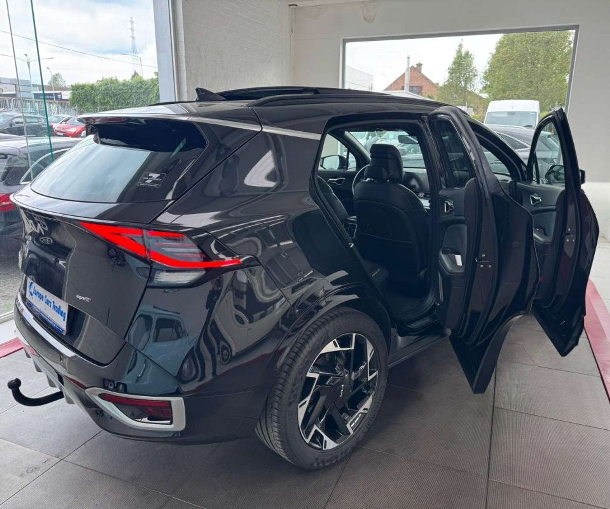 Kia Sportage GT LINE T.O PANO CUIR CARPLAY 1ÈRE MAIN GAR 12, Auto's, Automaat, Gebruikt, Zwart, Leder