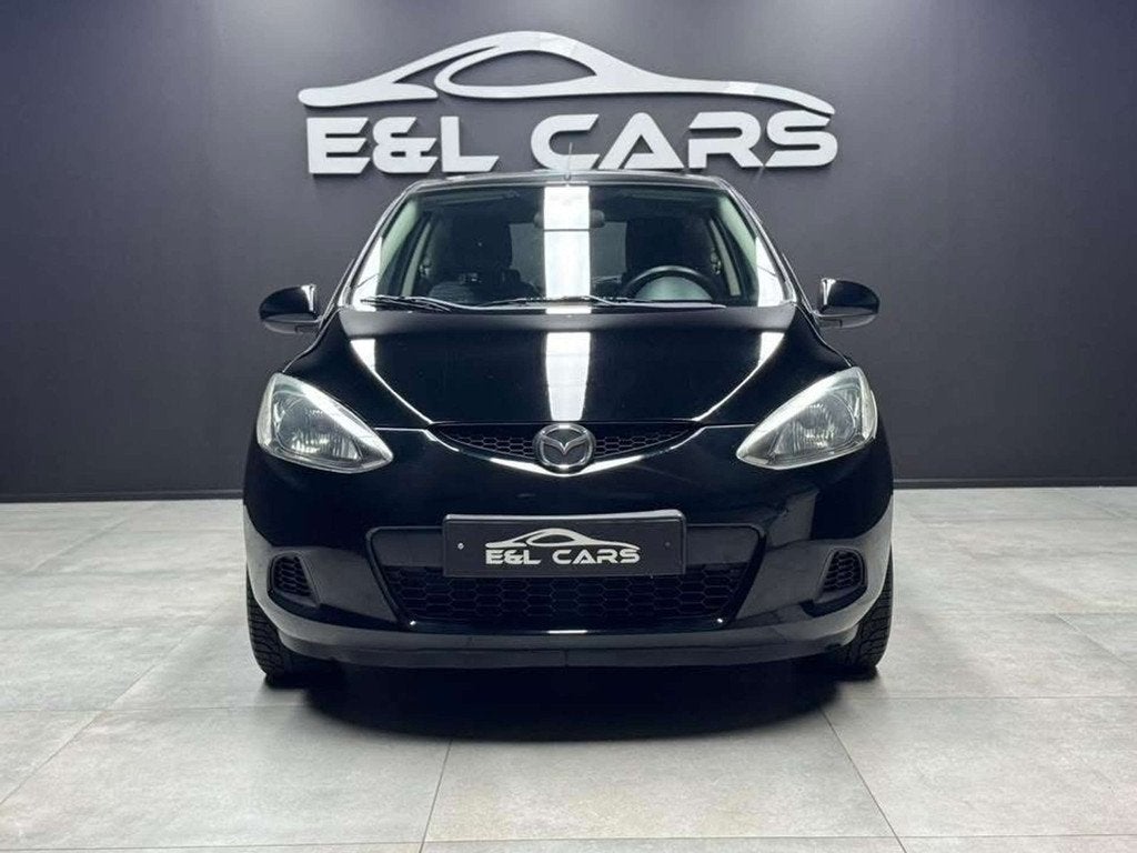 Mazda 2 2 1.4 CDVi *12 mois de garantie* (bj 2011), Auto's, Mazda, Stof, Zwart, 4 cilinders, Zwart