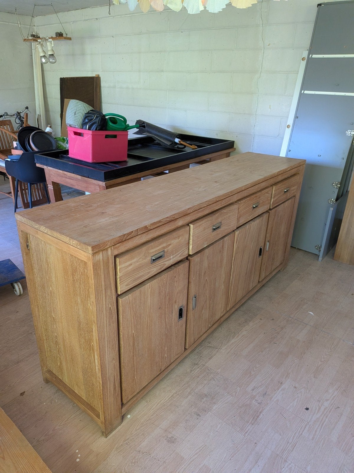 kast teak, Ophalen