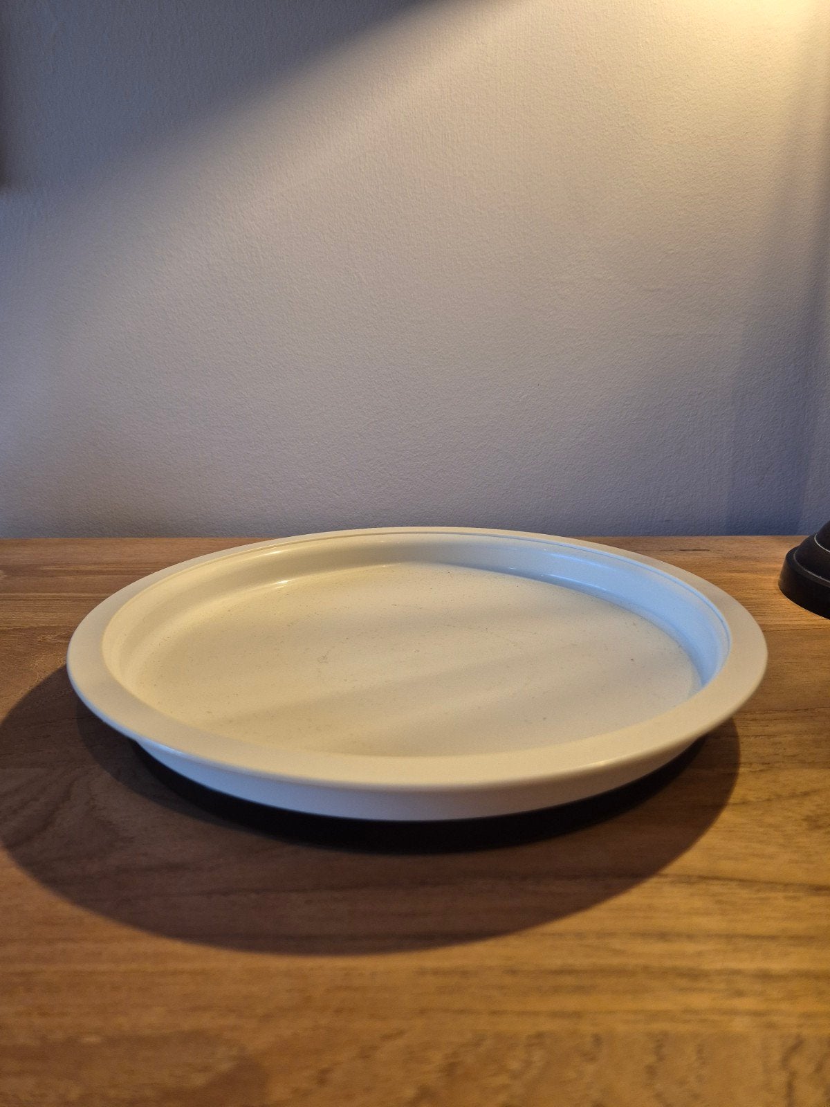 Draaischotel Tupperware, Ophalen