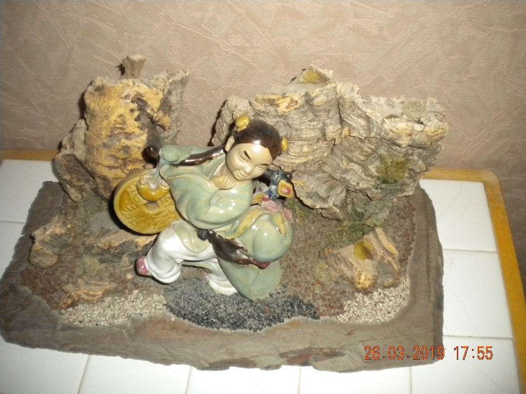 Beeld met zware steen, Ophalen