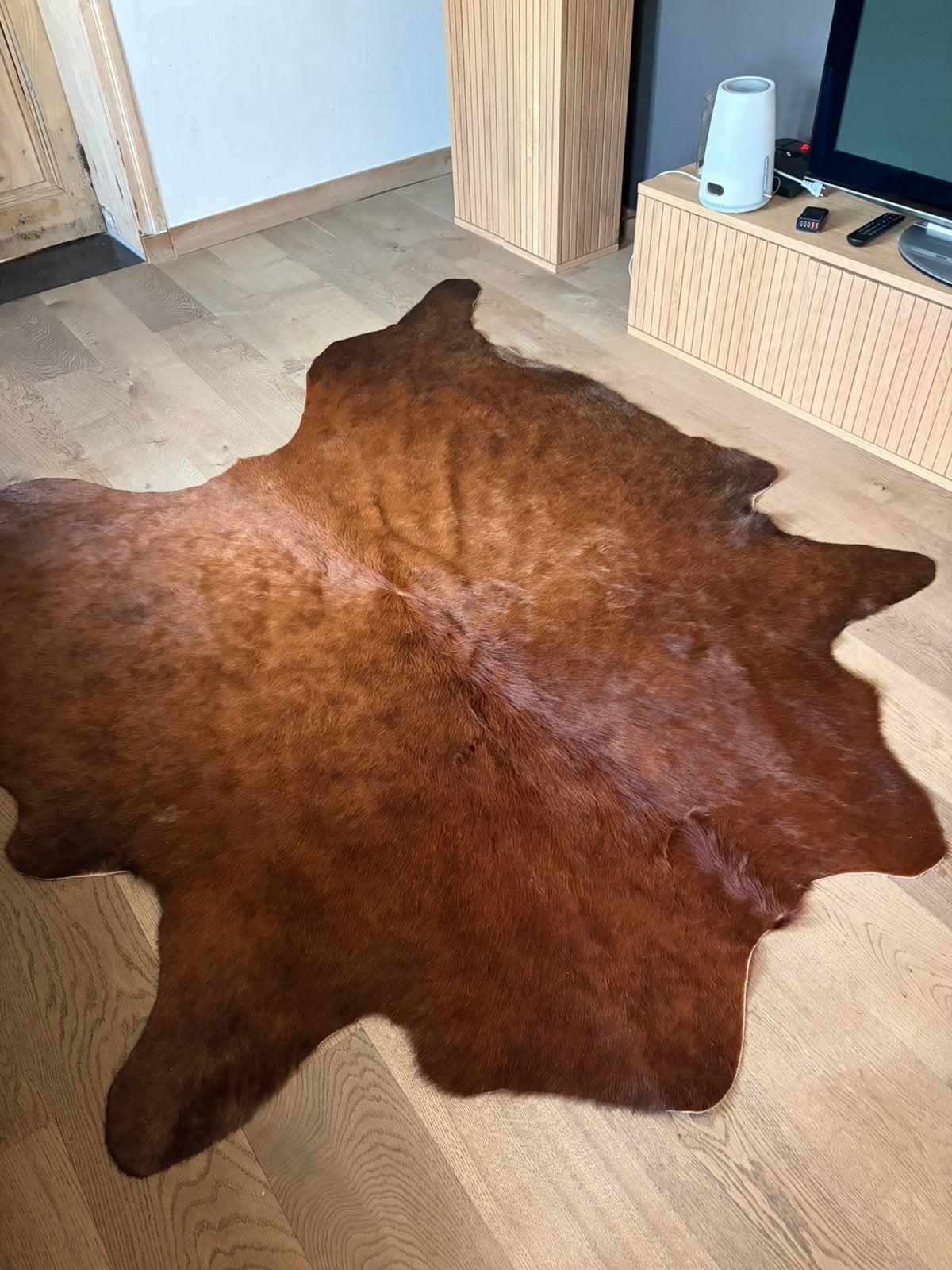 Tapis peau de vache, Enlèvement, Comme neuf