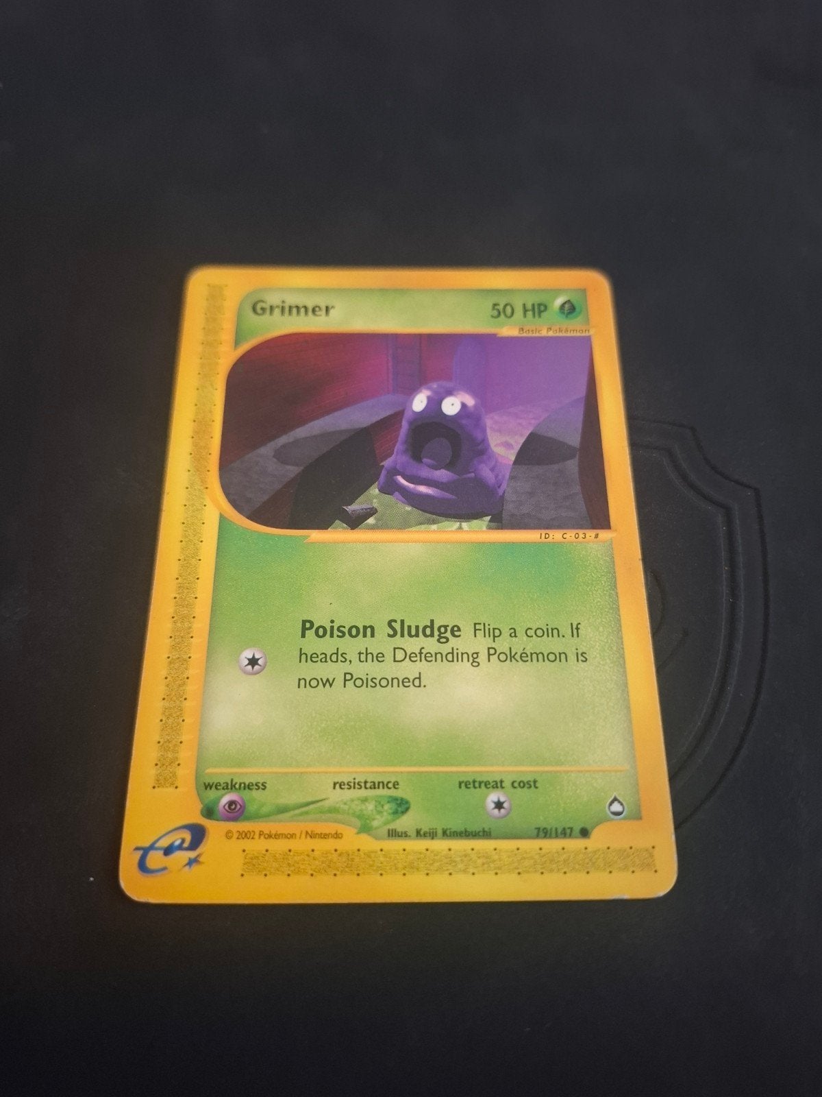 Grimey Pokémon Kaart - 2002 - 79/147, Ophalen of Verzenden