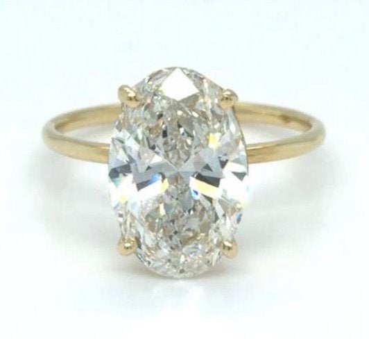 Geel gouden ring met ovale diamant van 3.07 karaat! nieuw!, Handtassen en Accessoires, Ringen, Geel, Nieuw, Ophalen of Verzenden