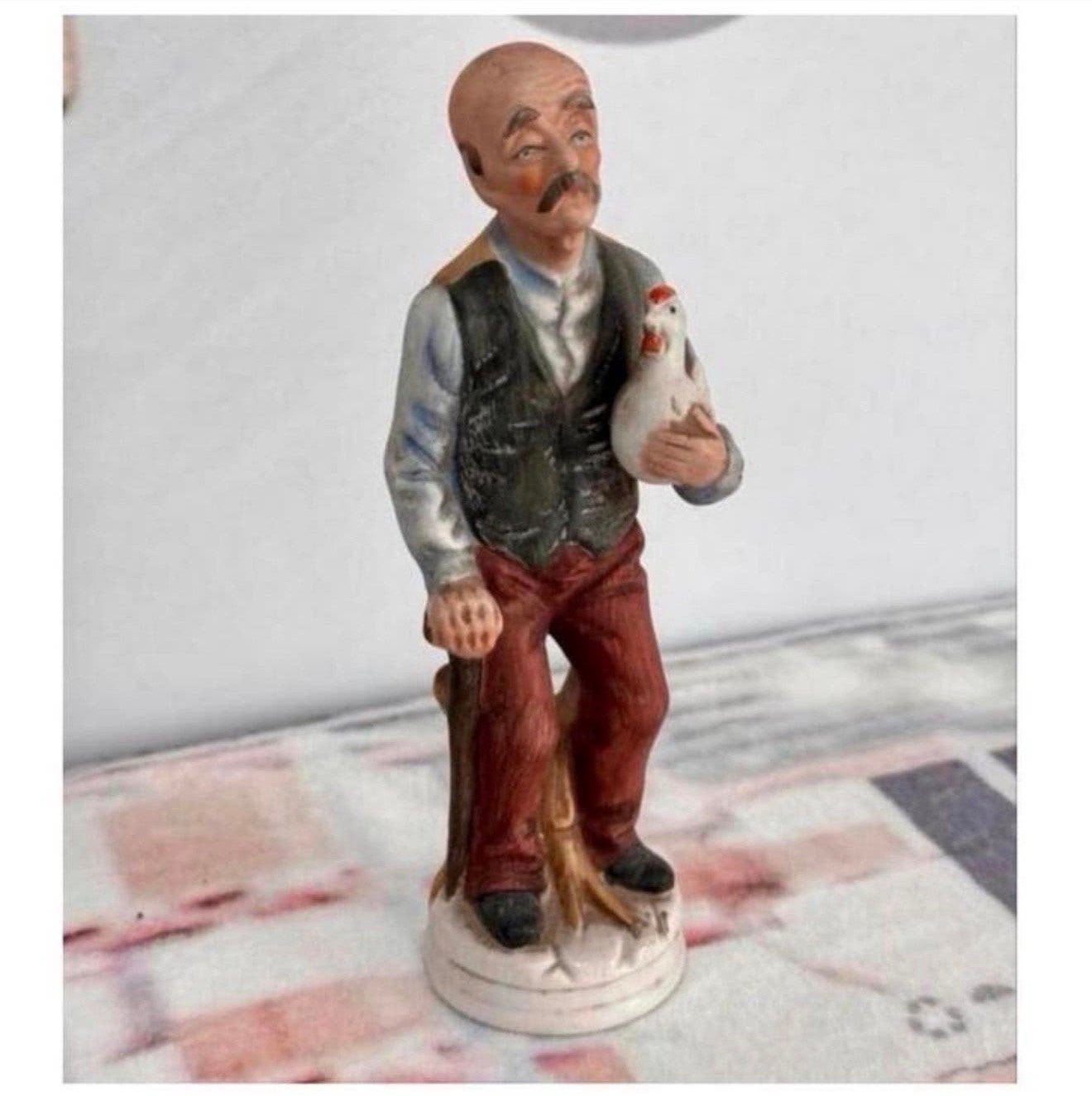 Figurine en porcelaine vintage 1990 Homme avec poulet 19CM, Collections, Enlèvement ou Envoi, Humain
