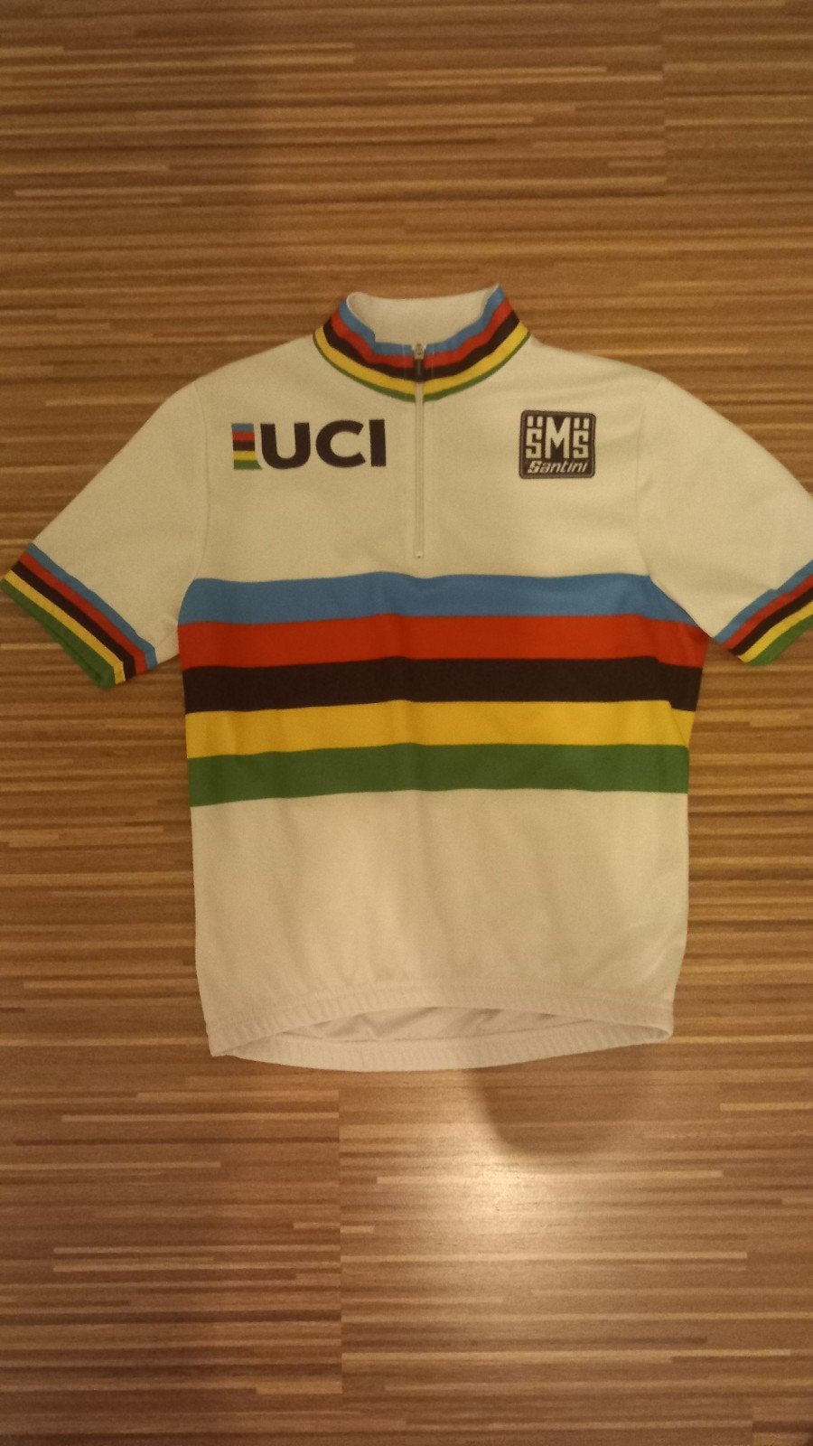 Regenboogtrui Santini, Ophalen