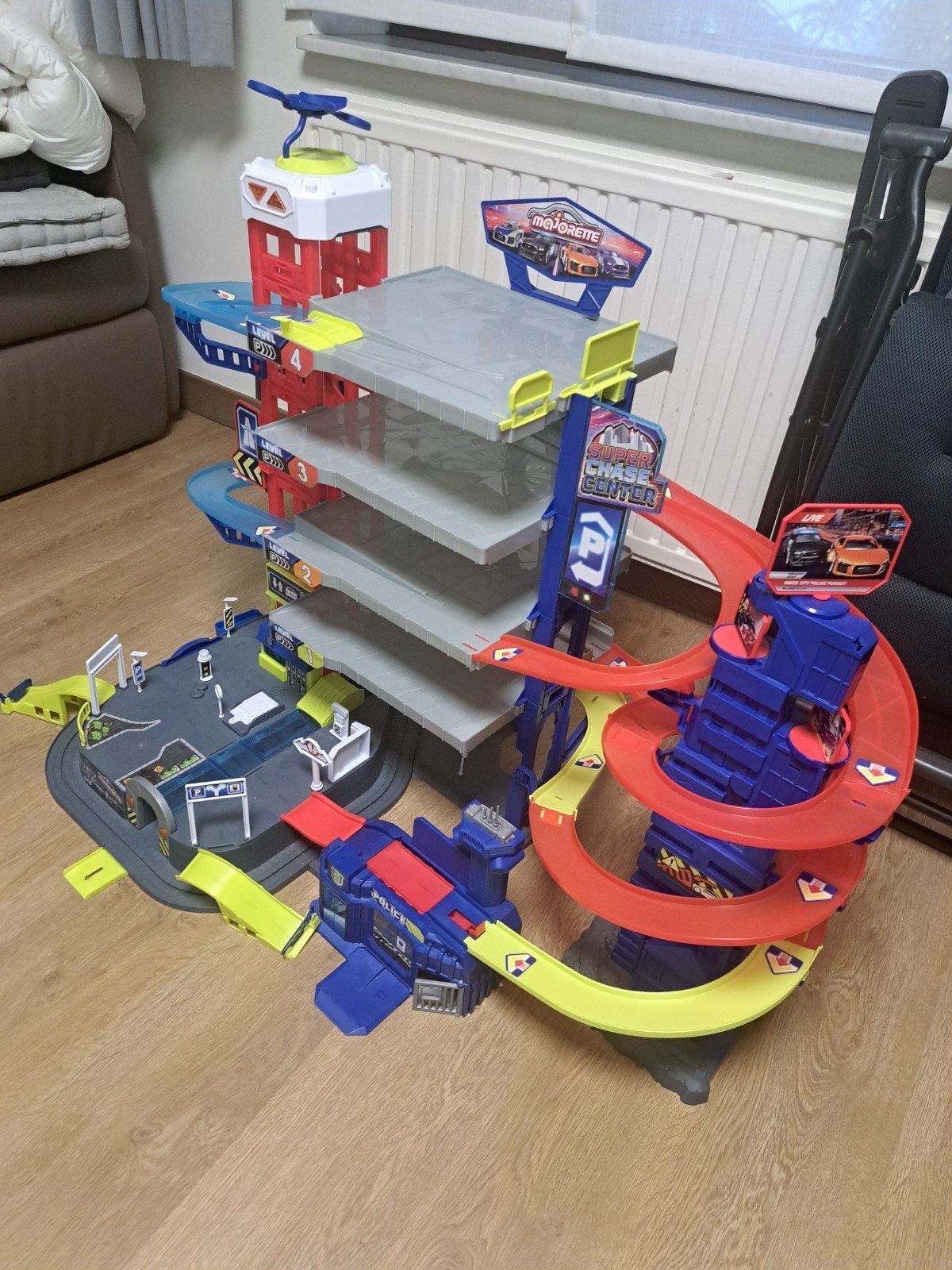 Majorette - super chase center + tientallen autootjes!, Kinderen en Baby's, Speelgoed | Racebanen, Racebaan, Zo goed als nieuw