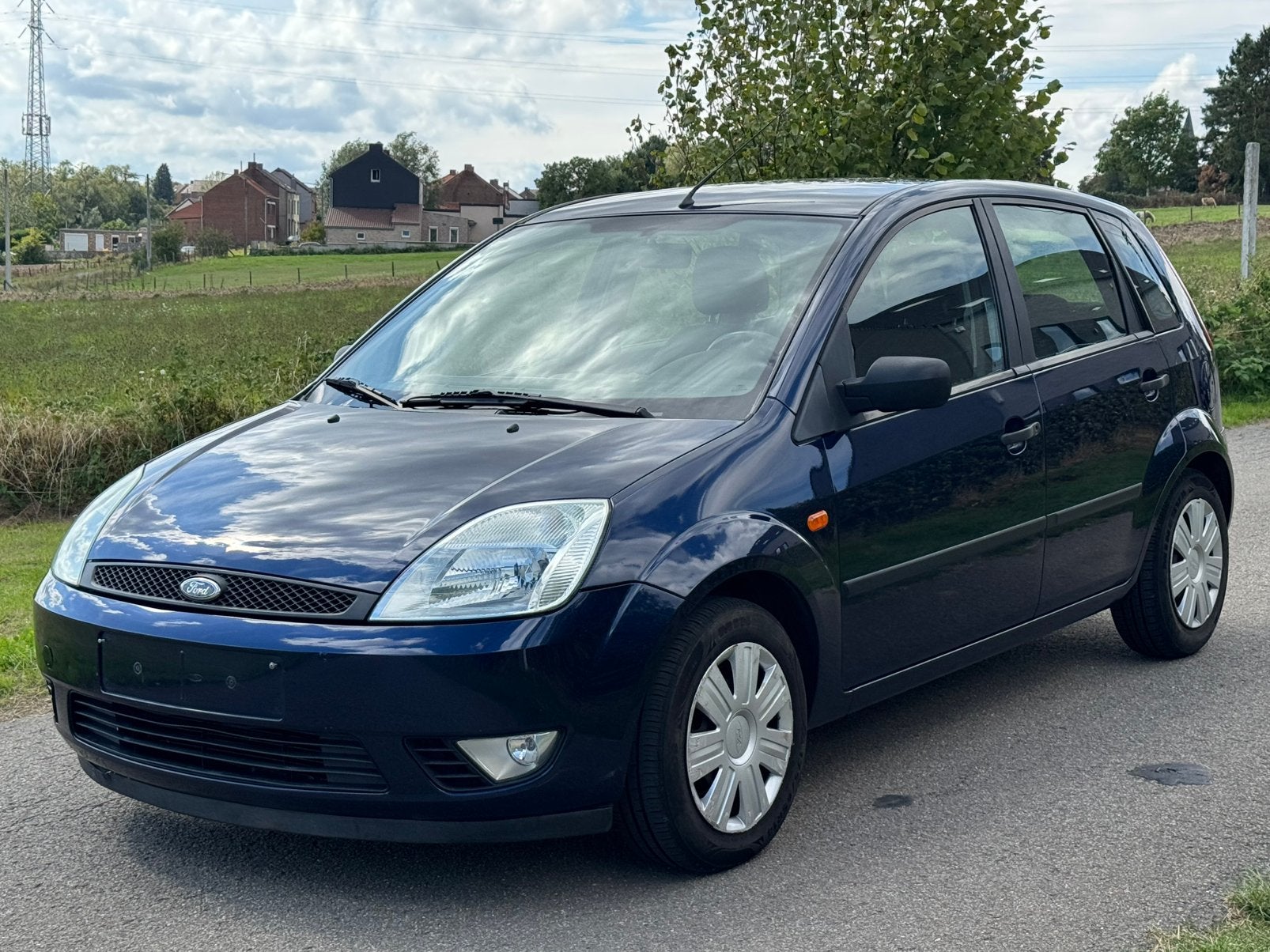Ford Fiesta 1.3I 2005 Airco Ct ok Faible Km Euro4 Petit Prix, Auto's, Dealer onderhouden, Stof, Blauw, Bedrijf