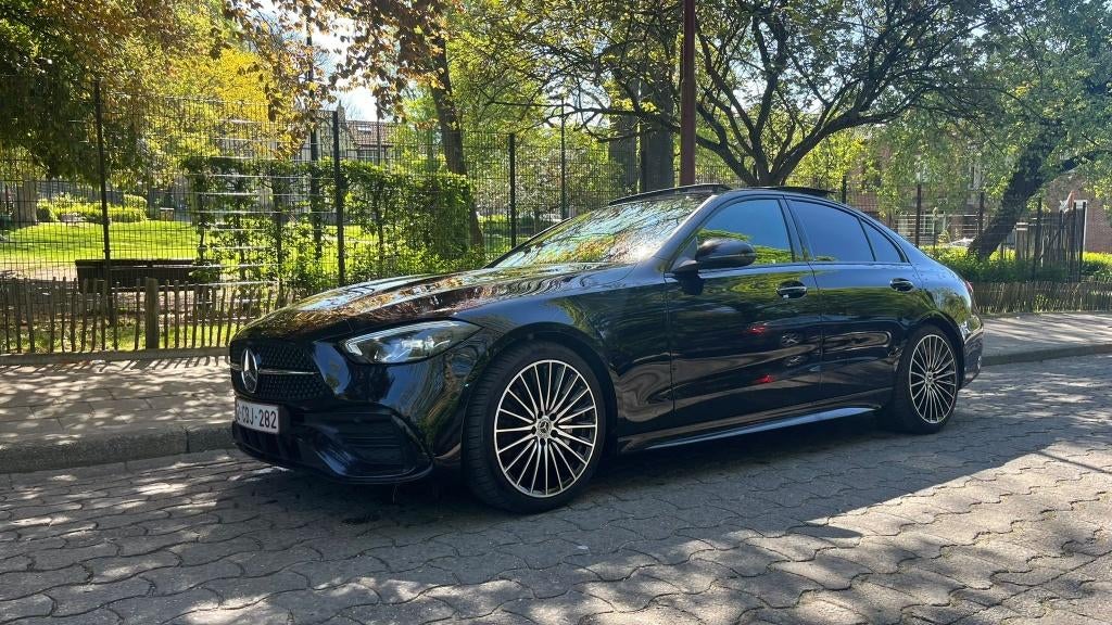 Mercedes-Benz C180, AMG line, panoramisch dak, Automaat, Achterwielaandrijving, Zwart, Leder