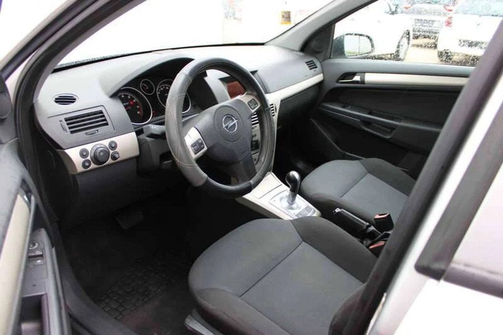 Opel Astra Airco/Cruise Inclsuief 2 JAAR garantie!, Automaat, Gebruikt, Zwart, Bedrijf