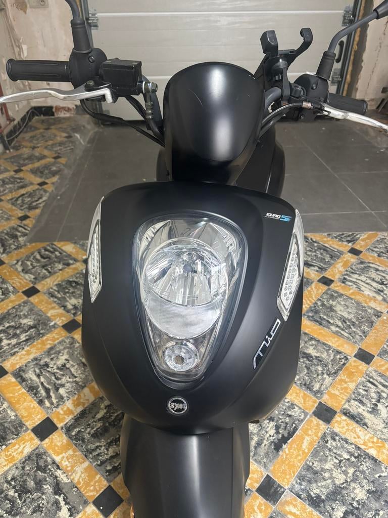 Sym mio i50, Enlèvement, Comme neuf, Essence, Mio