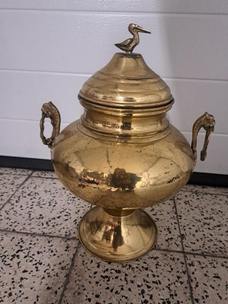 Koperen pot, Ophalen