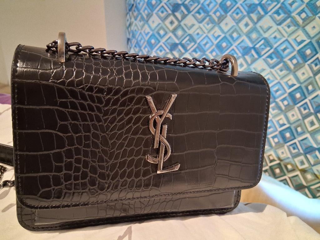 Sac yves saint laurent, Enlèvement