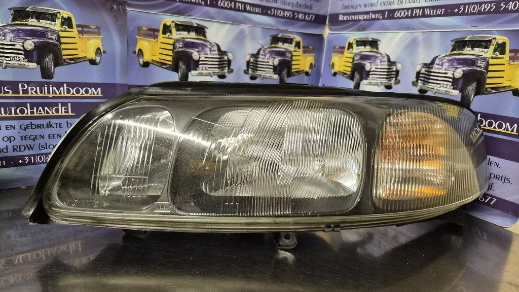 volvo s60 koplamp links rtnr 89007859., Auto-onderdelen, Verlichting, Volvo, Gebruikt
