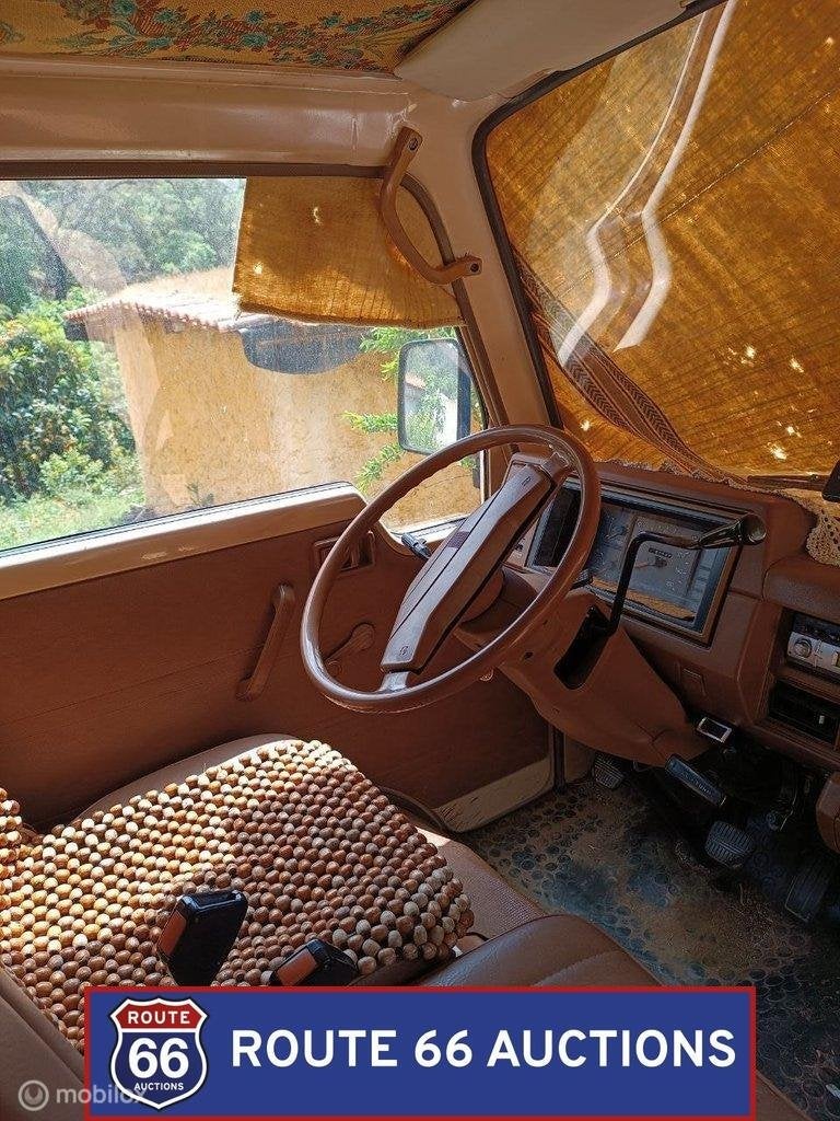 Nissan Urvan E23 | 1986 | Route 66 Auctions, Auto's, Zwart, Bedrijf, Handgeschakeld, Overige carrosserie