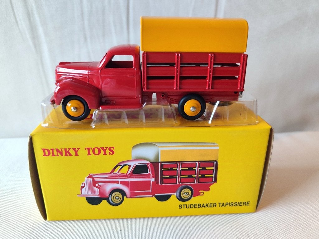 Dinky Atlas _ Studebaker Tapissiere _ ref. 25L., Enlèvement ou Envoi, Comme neuf, Bus ou Camion, Dinky Toys