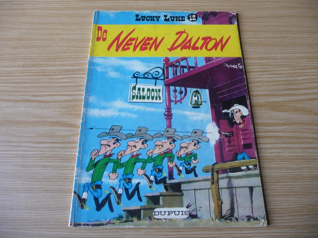 Lucky Luke 12. De neven Dalton 1977  €4, Gelezen, Eén stripboek, Ophalen of Verzenden, Morris