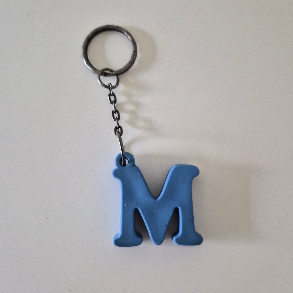 Sleutelhanger 'M', Verzamelen, Ophalen of Verzenden, Gebruikt, Overige typen