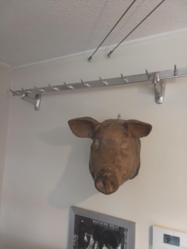 Uit de slagerij,hakenrail, Ophalen