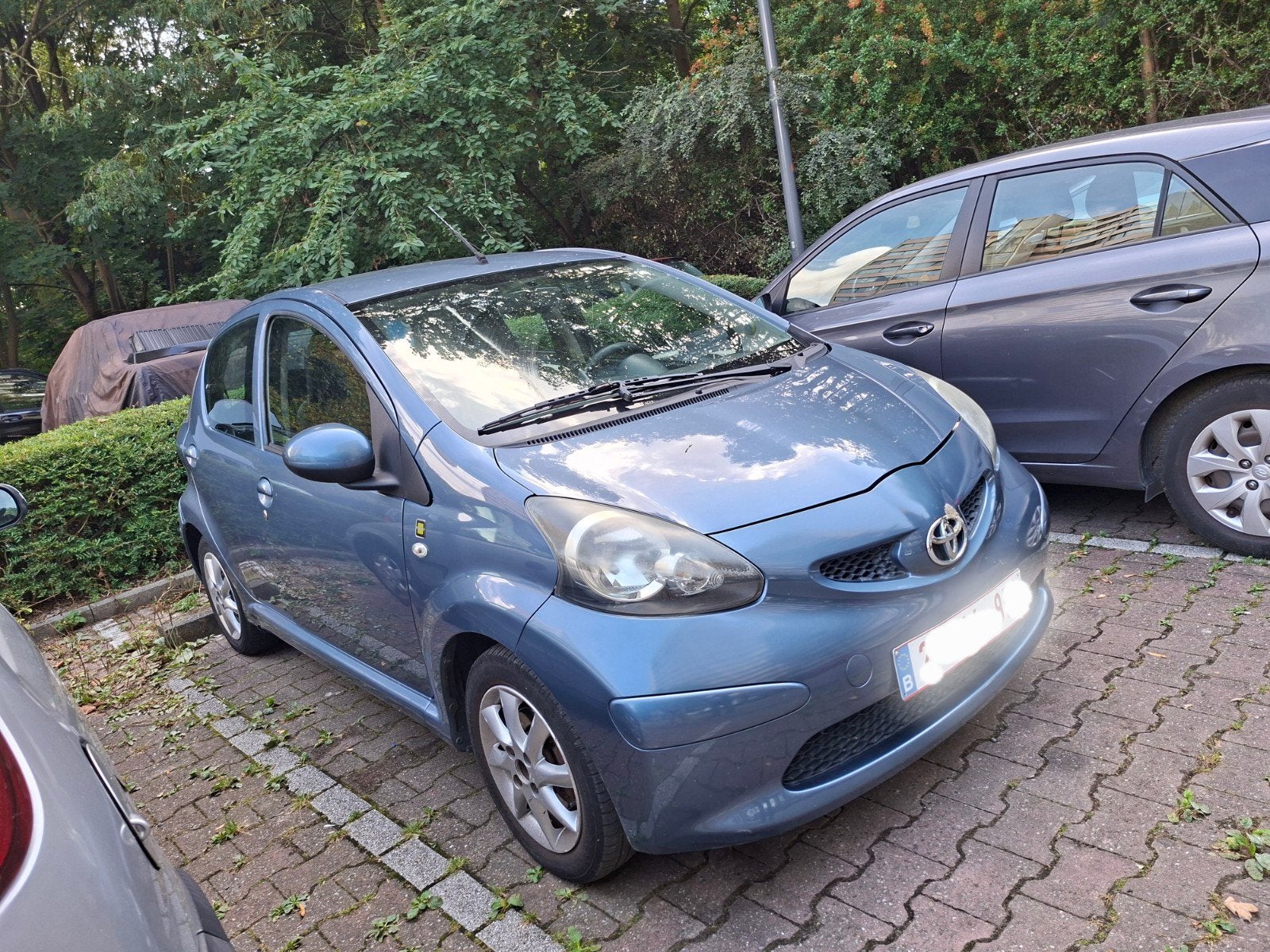 Toyota AYGO, Auto's, Toyota, Voorwielaandrijving, Blauw, Leder en Stof, Overige kleuren