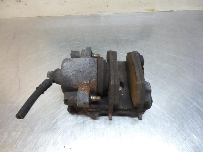 Etrier de frein (pince) avant gauche d'un Volkswagen UP (UP, Volkswagen, -, 3 mois de garantie, Utilisé