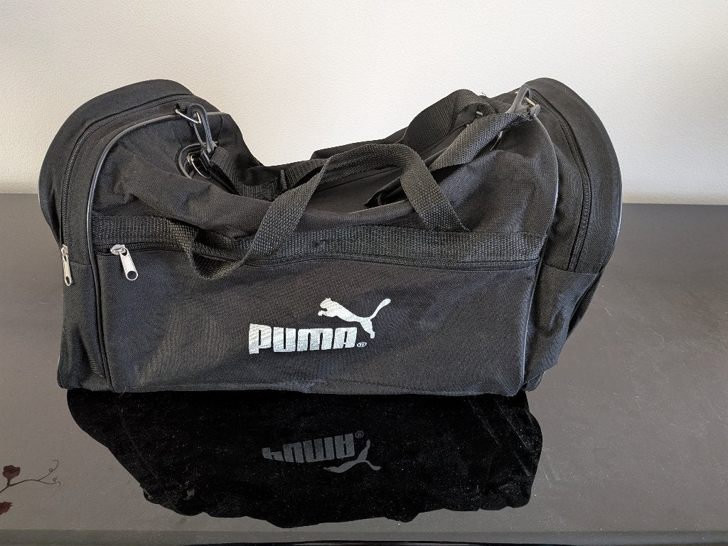 Puma  zwarte sportzak, Ophalen of Verzenden, Zo goed als nieuw, Unisex volwassen