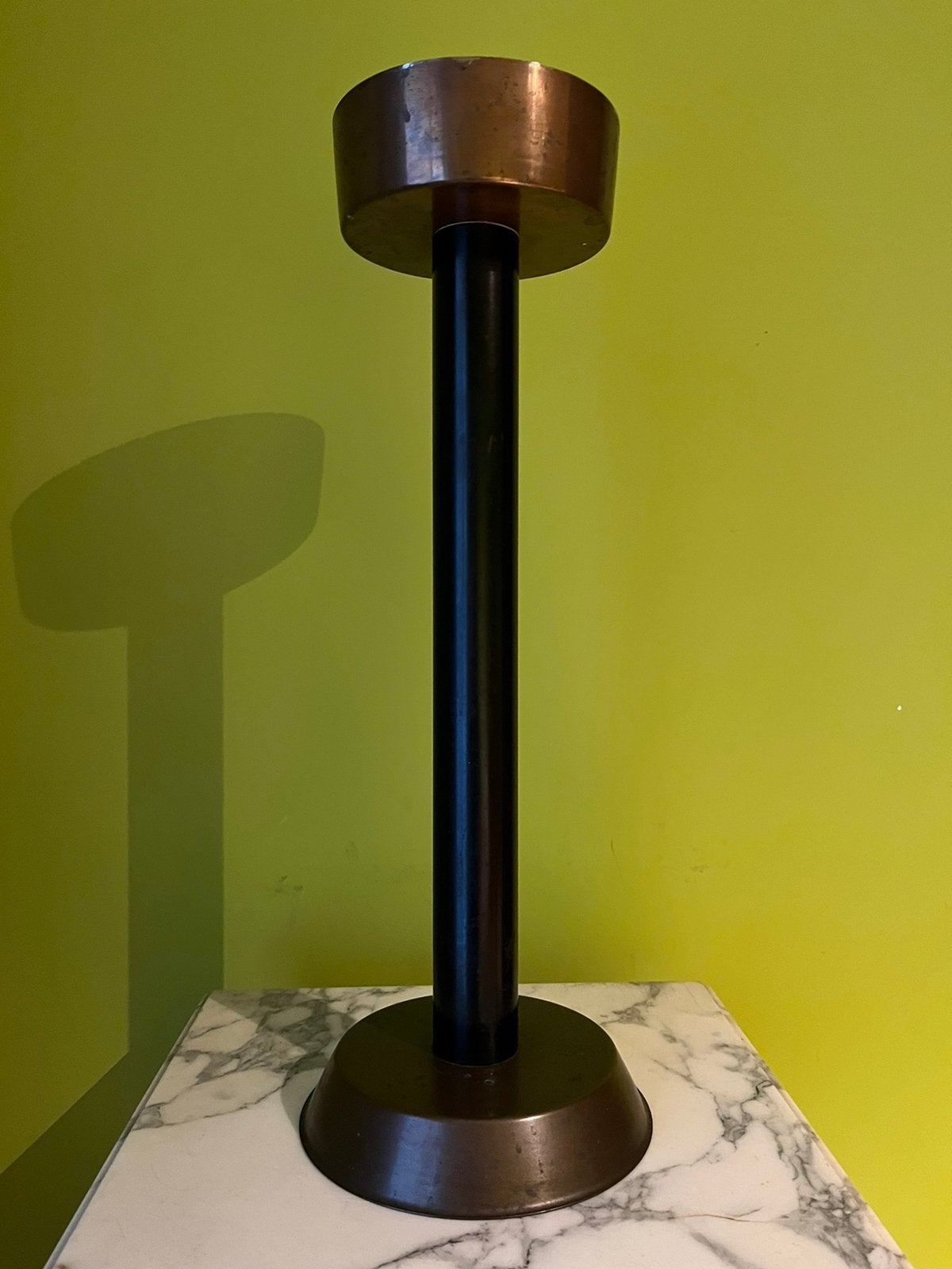 Koperen staander, Ophalen