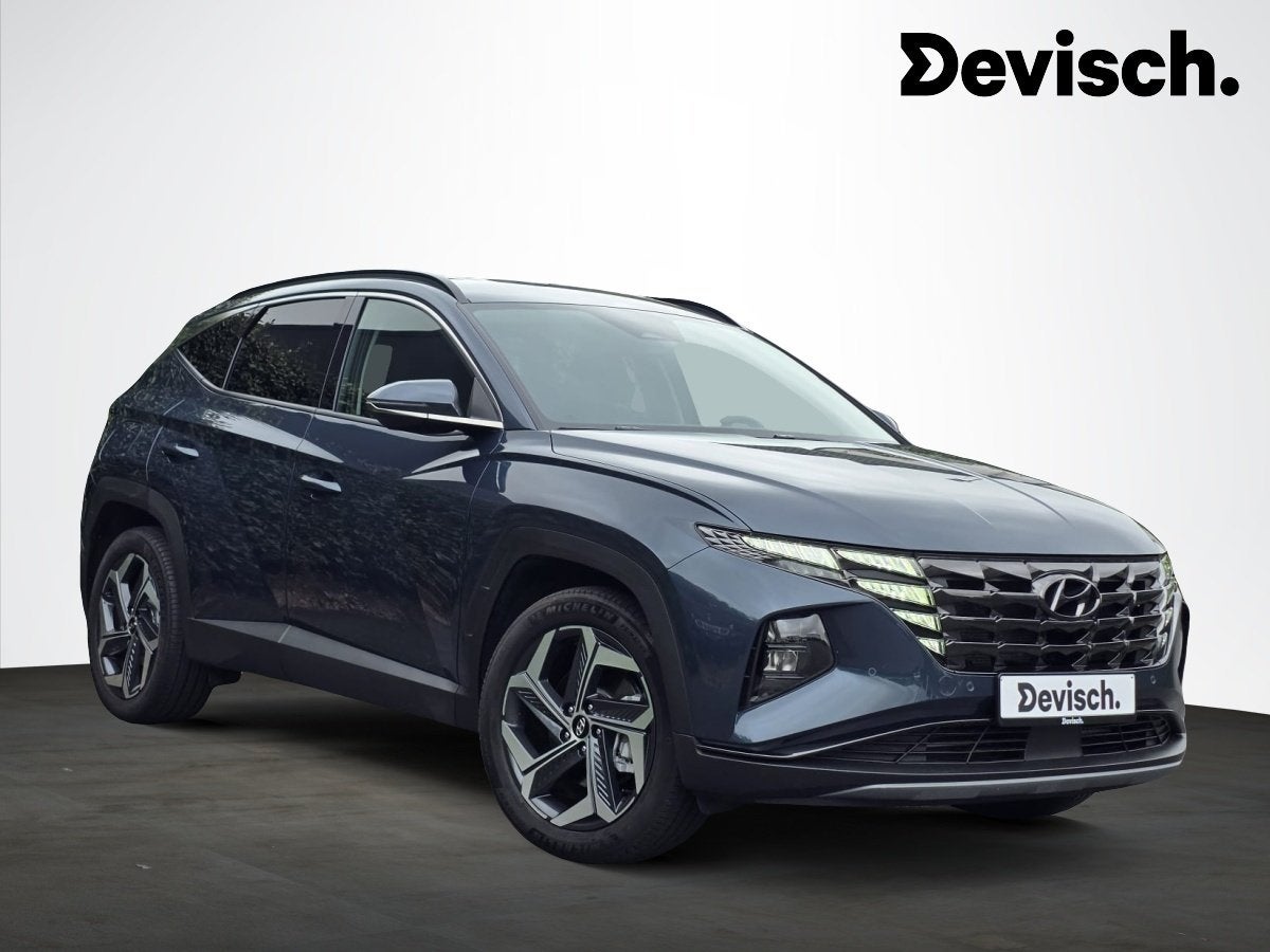 Hyundai Tucson PHEV 1.6 T-GDi A/T LIMITED EDITION 4WD, Auto's, Automaat, 4 deurs, 4 cilinders, Blauw