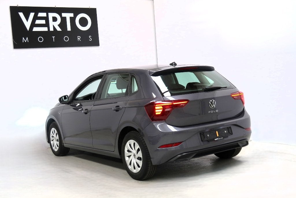Volkswagen Polo TSI DSG, Auto's, Stof, 5 deurs, 3 cilinders, Zilver of Grijs
