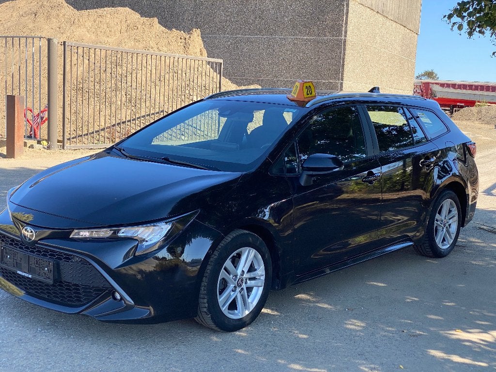 Toyota Corolla SW 1.2 Turbo Dynamic Plus, Voorwielaandrijving, Dealer onderhouden, Stof, 4 cilinders