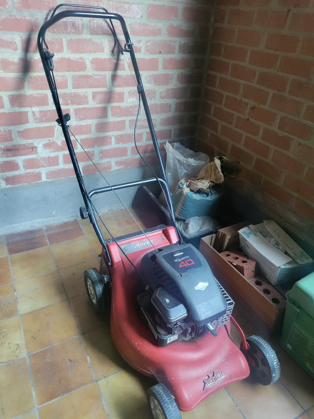 Grasmaaier op benzine, Ophalen