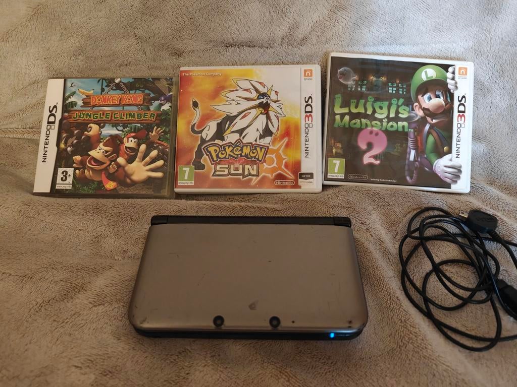 Nintendo DSi XL met 3 games., Ophalen of Verzenden, 3DS