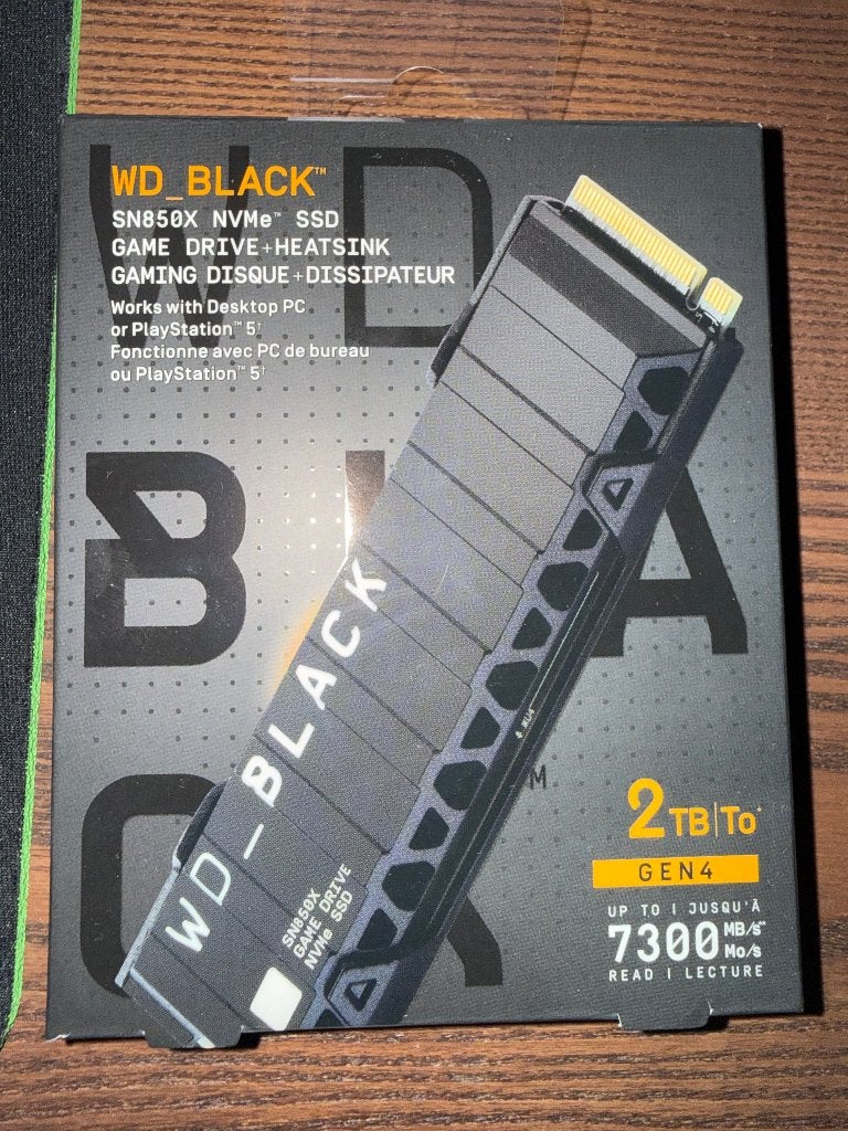 SSD WD_Black SN850X 2 To avec dissipateur  (sous garantie), Enlèvement, Comme neuf, Playstation 5