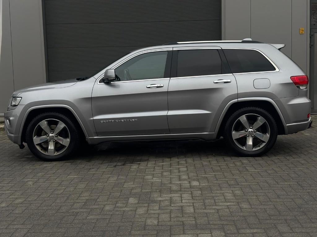 Jeep Grand Cherokee pano dak 48.000km, Auto's, Jeep, Automaat, USB, 2987 cc, Leder