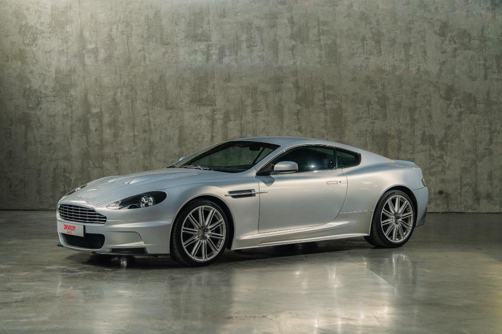 Aston Martin DBS handleiding 2010, Auto's, Achterwielaandrijving, Zwart, 12 cilinders, Bedrijf