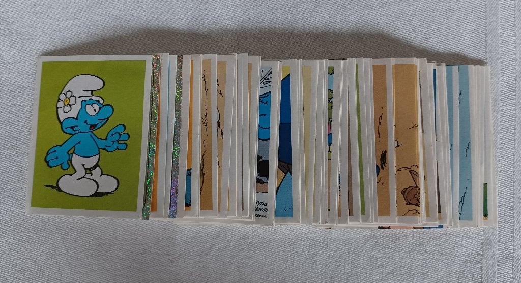 63 Panini stickers De Smurfen (2008), Hobby en Vrije tijd, Ophalen of Verzenden, Zo goed als nieuw, Meerdere stickers