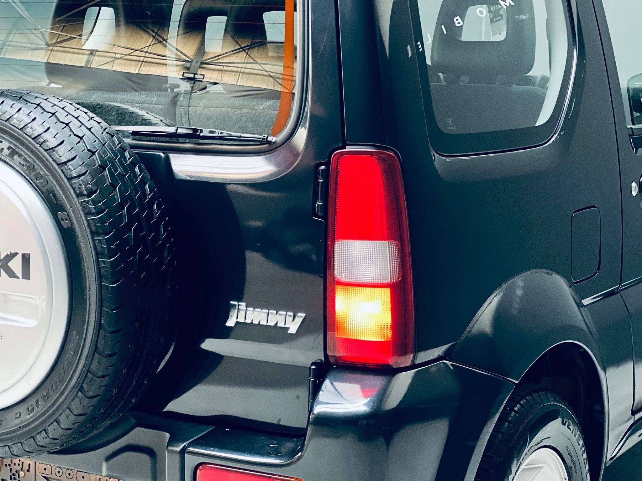 Suzuki Jimny 1.3i *4X4*CLIMATISATION*4 PLACES*GARANTIE*, Auto's, Suzuki, 4 zetels, Stof, Gebruikt, Zwart