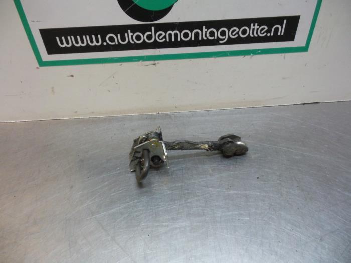 Butée 4portes arrière gauche d'un Opel Corsa (Corsa C 00-), -, Opel, Utilisé, -