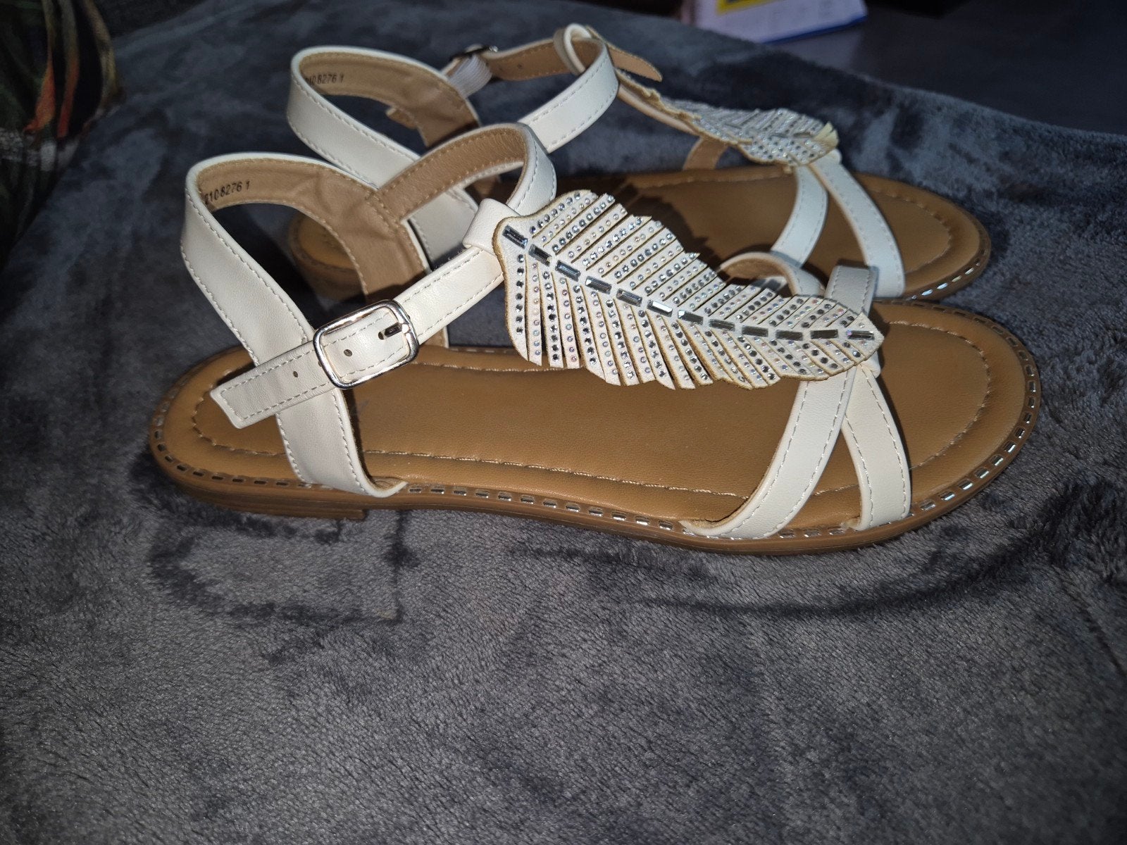 Graceland witte sandalen met veren en strass, Enlèvement
