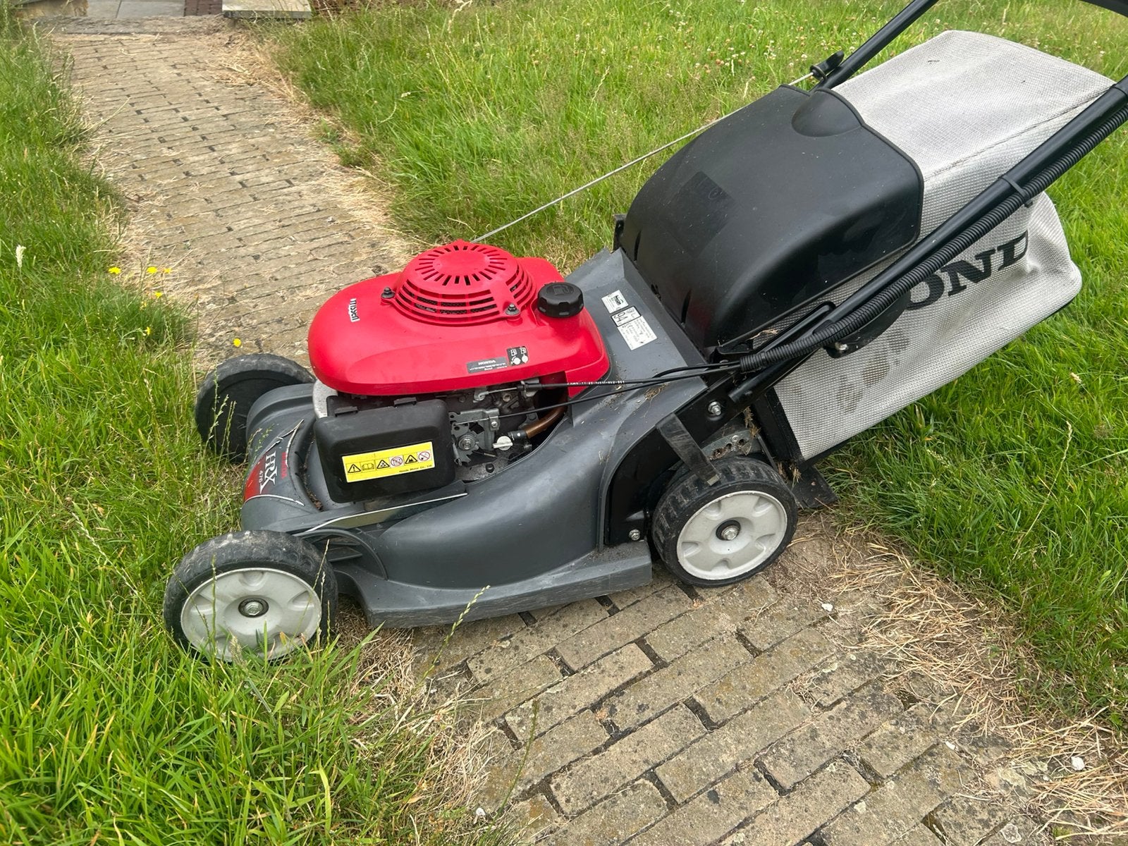 Honda hrx476 grasmaaier, Tuin en Terras, Grasmaaiers, Ophalen, Zo goed als nieuw, Opvangbak