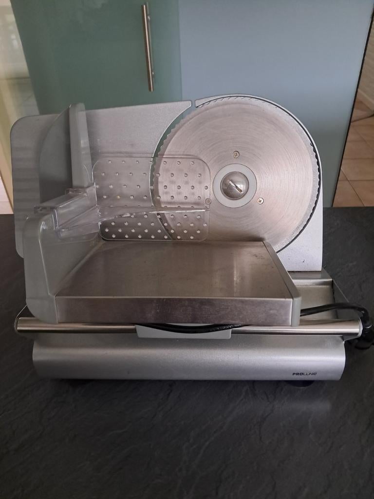 Brood snijmachine, Ophalen