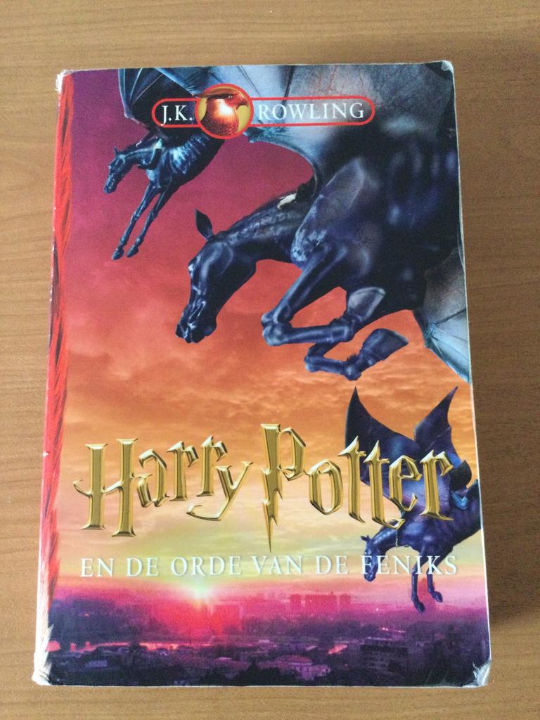 Harry Potter en de orde van de Feniks  - J.K. Rowling, Boeken, Ophalen of Verzenden, Gelezen