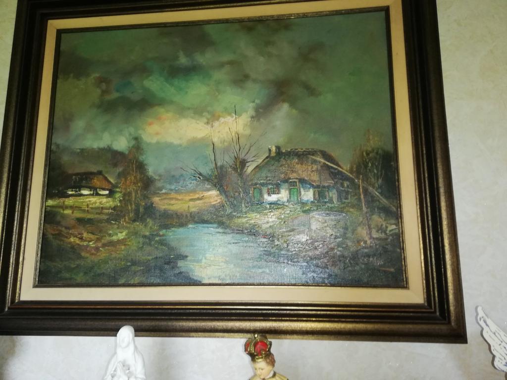 Schilderij dorpstafereel, Ophalen